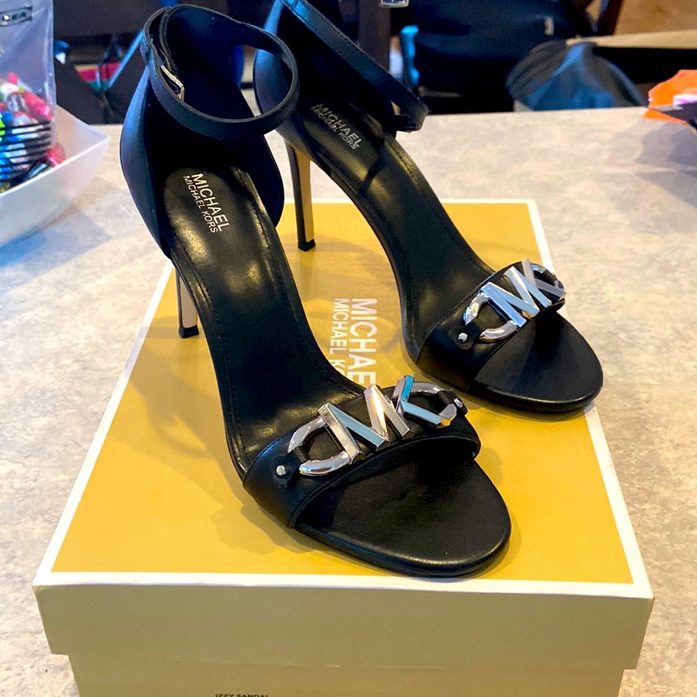 Sexy sexy sized 8.5 brand new in the box Michael Kors sandals!